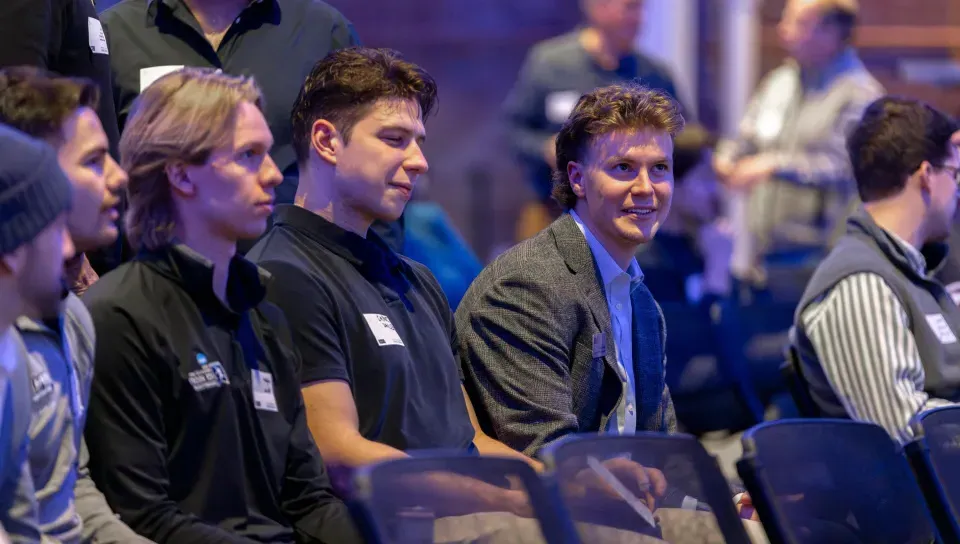 UNE students watch a panel discussion in Innovation Hall